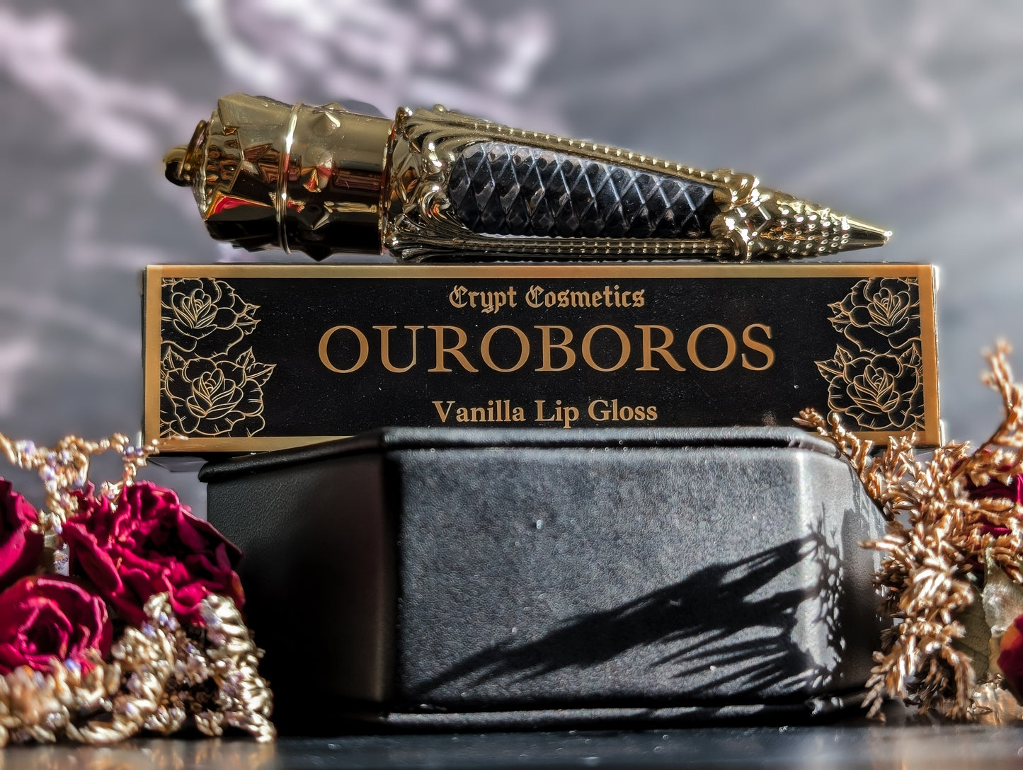 OUROBOROS - Black vanilla lip gloss